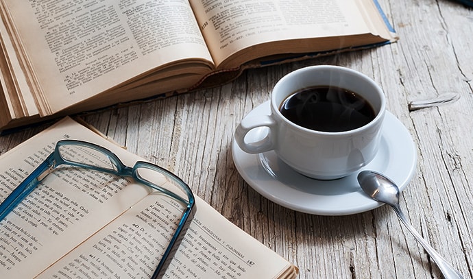 books-coffee-table-reading-glasses